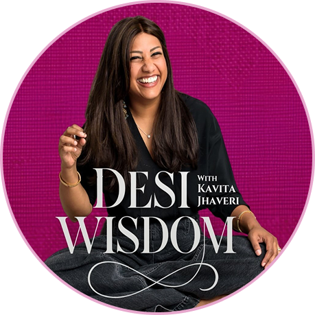 Kavita smiling with lotus in background