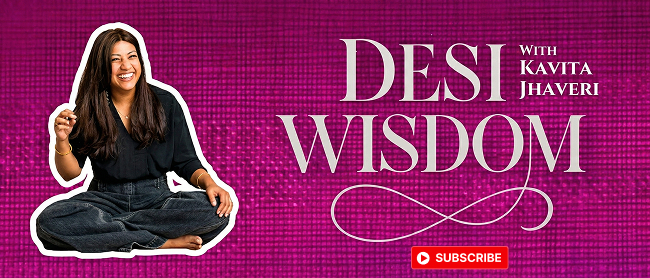 Kavita smiling with lotus in background